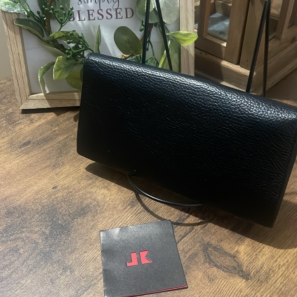 Junko wallet
Elegant Black Leather - Picture 5 of 7